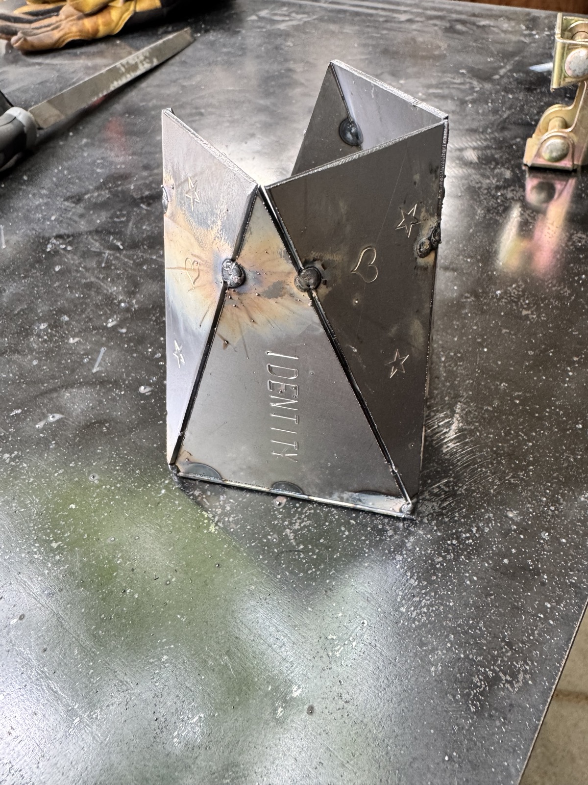 all four panels welded up, heat color around the joints