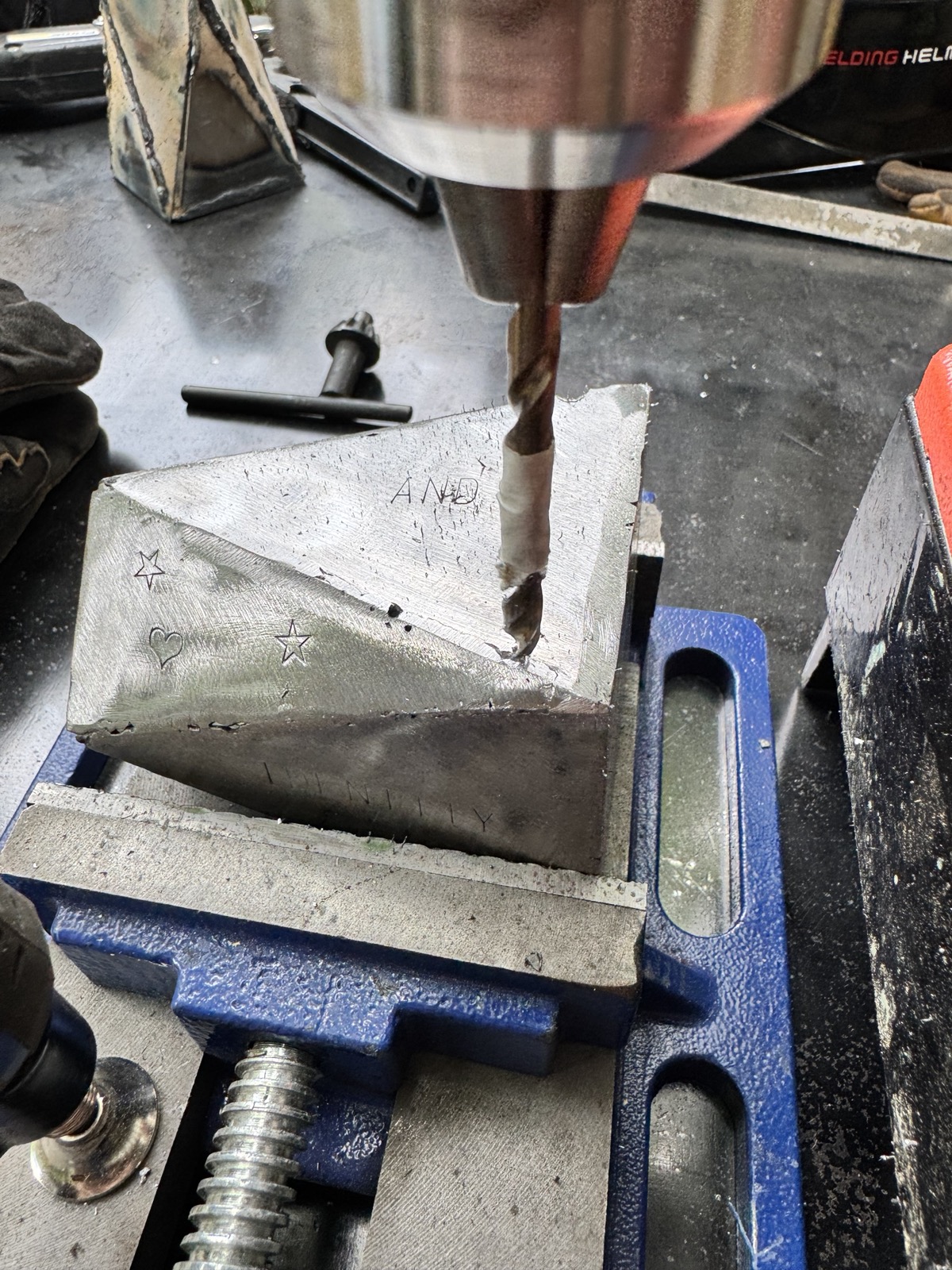 drilling the vent holes through the base, box clamped in the drill press vise
