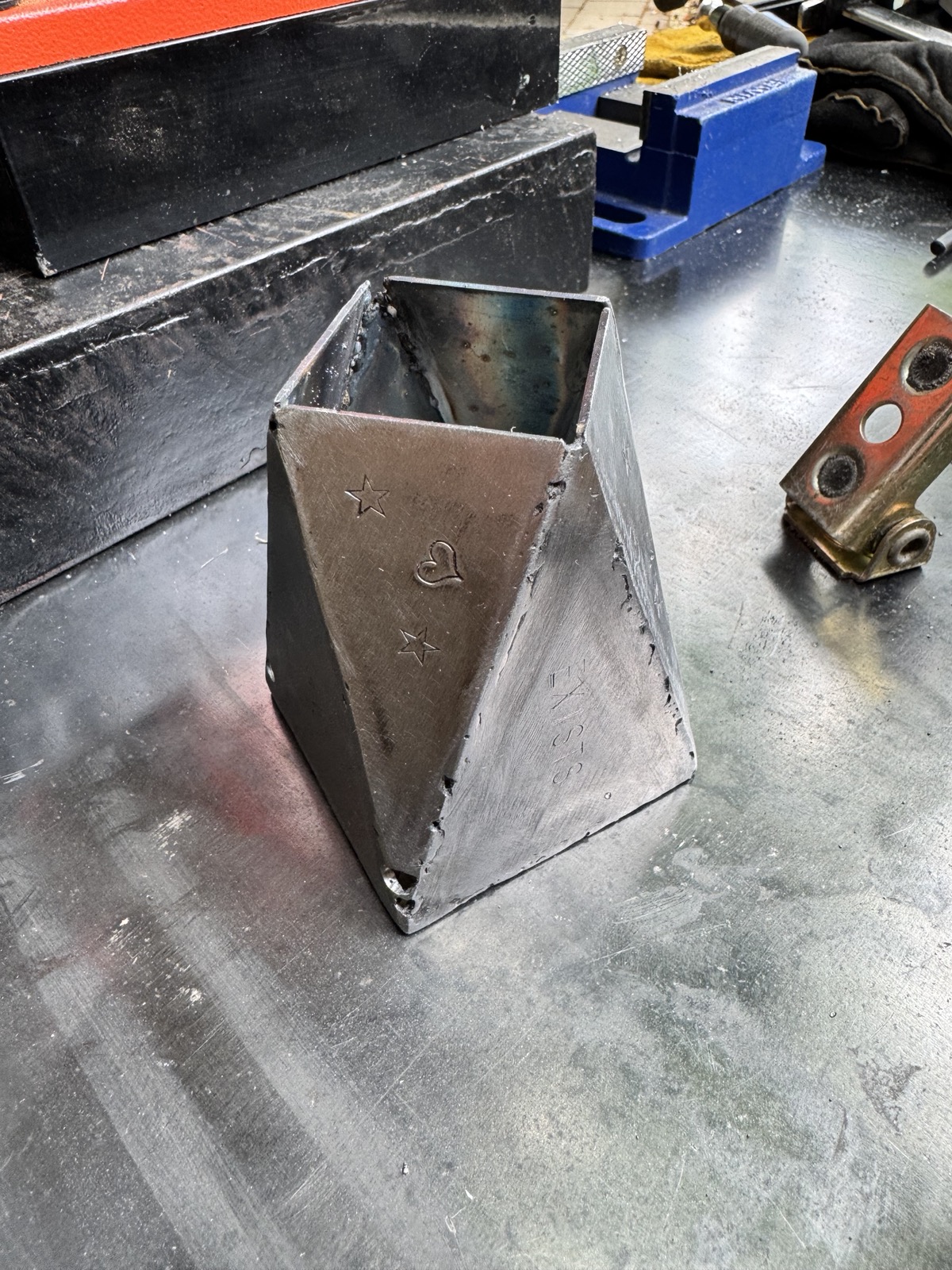 the finished burn box, vent hole visible at the base