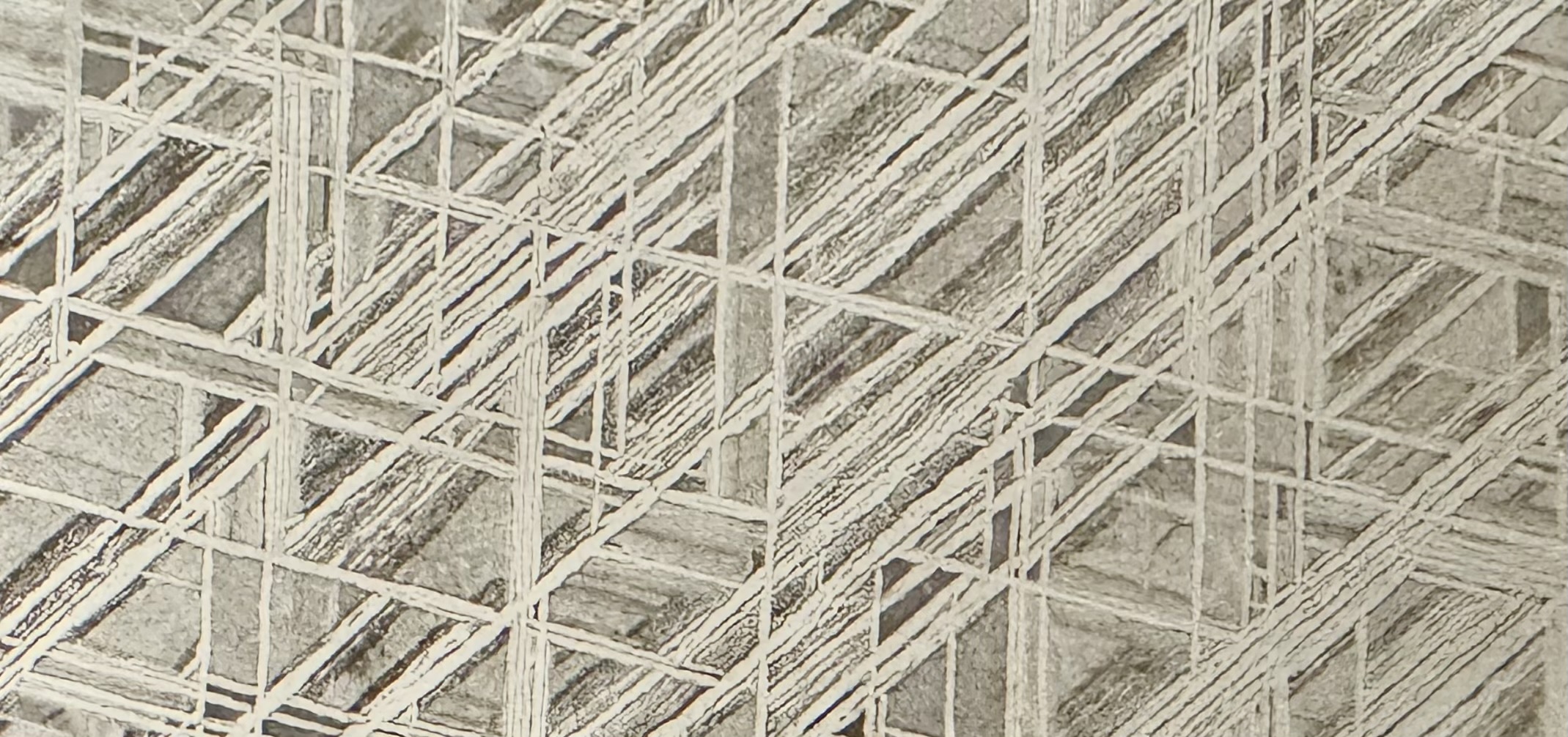 Widmanstätten pattern on a fragment of meteorite.
