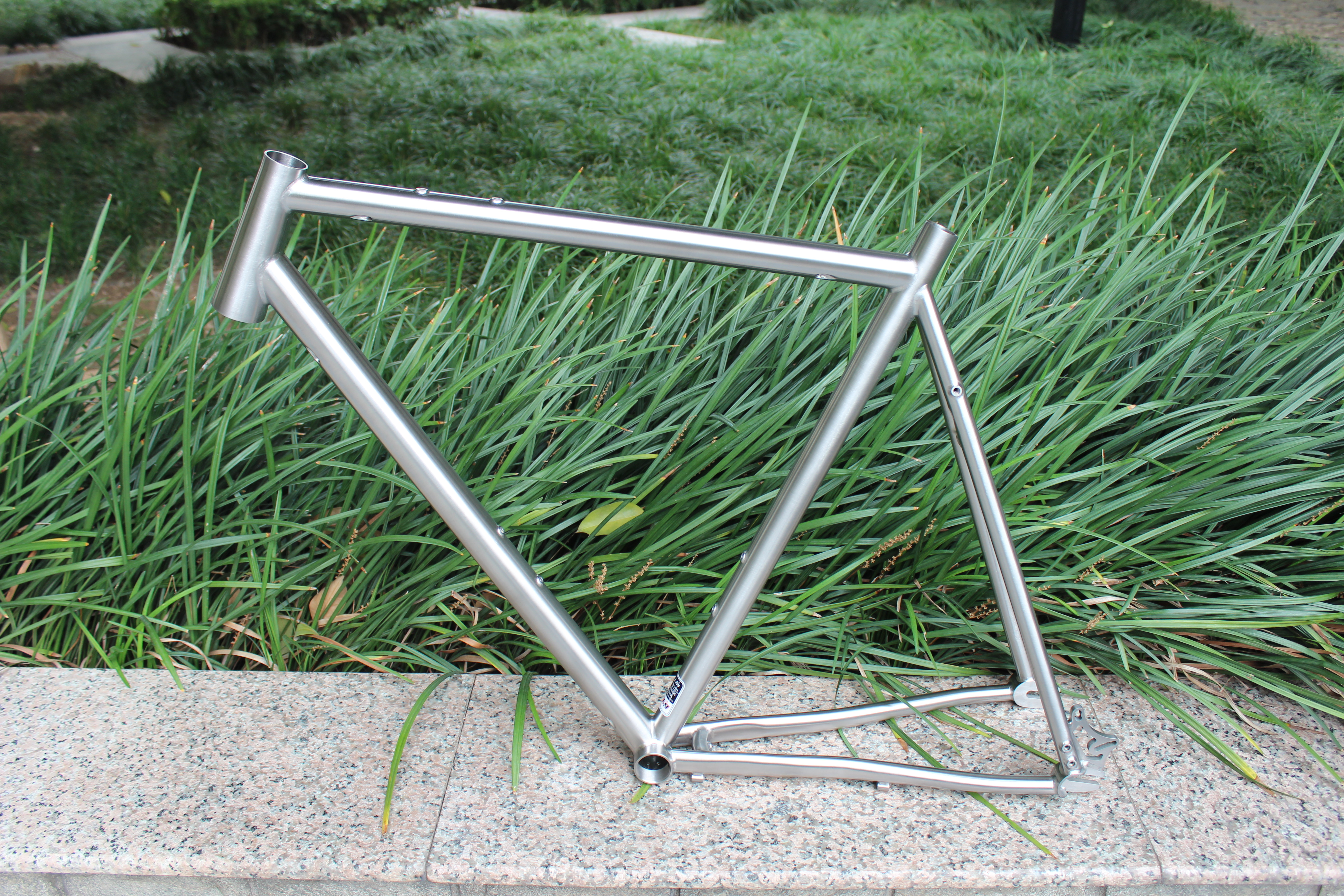 a titanium bicycle frame just after production