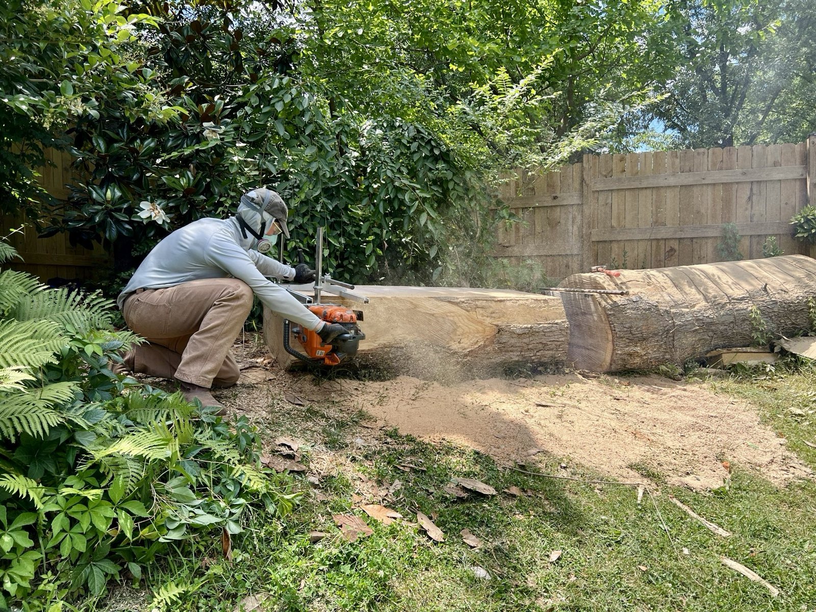 Beginning a cut with the mill on a flattened log